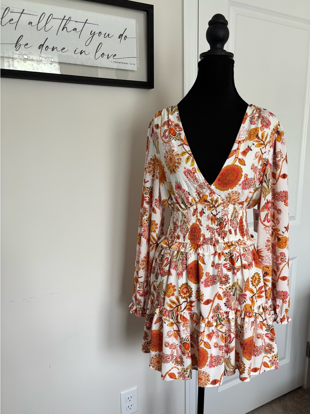 Floral V-Neck Smocked Mini Dress in White with Orange Print